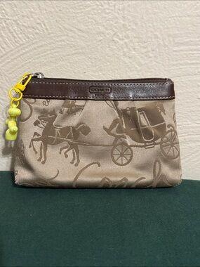 Coach Brown Signature Horse & Carriage Wristlet with Yellow Charm